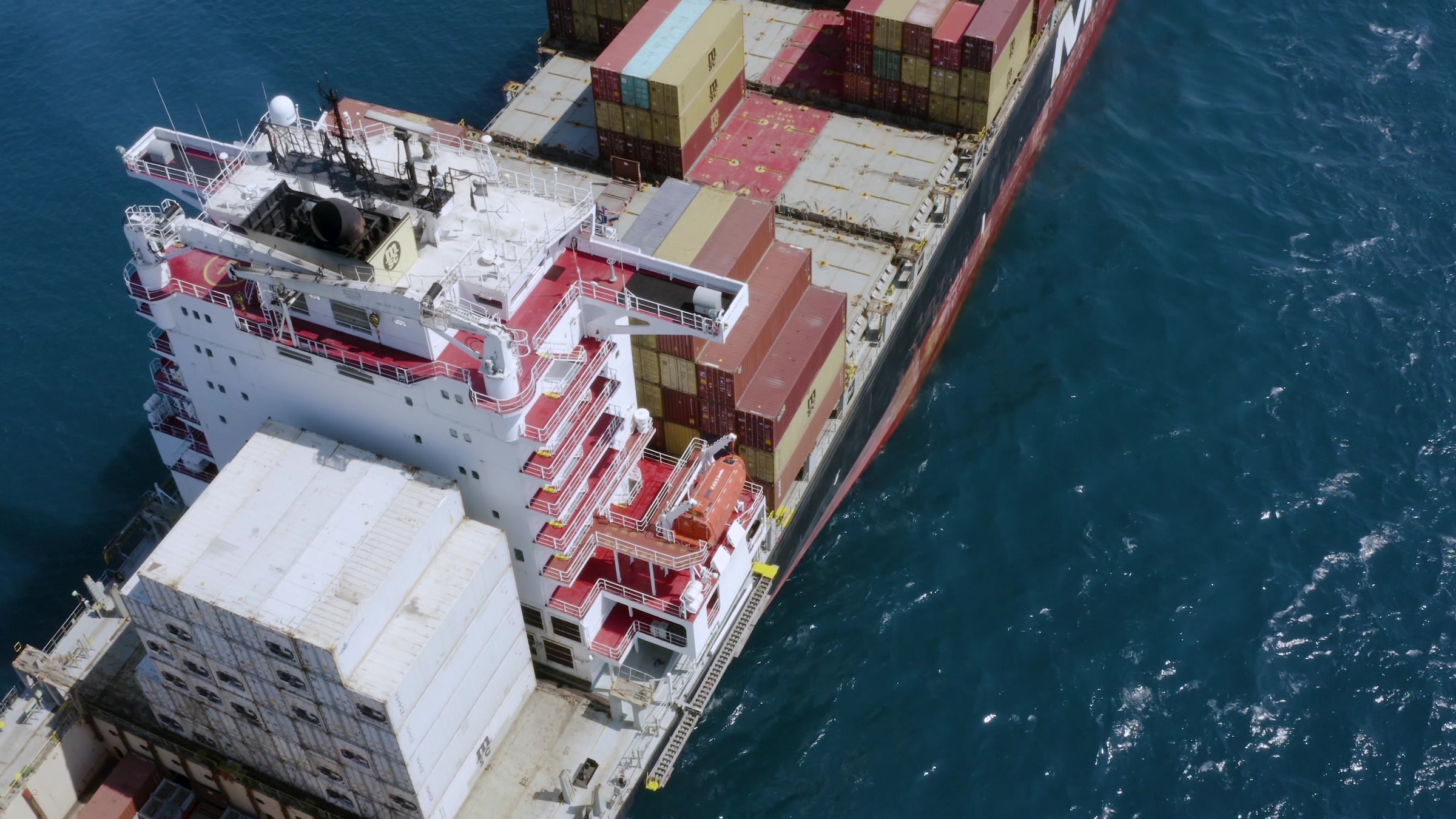 Container ship carrying goods across the sea