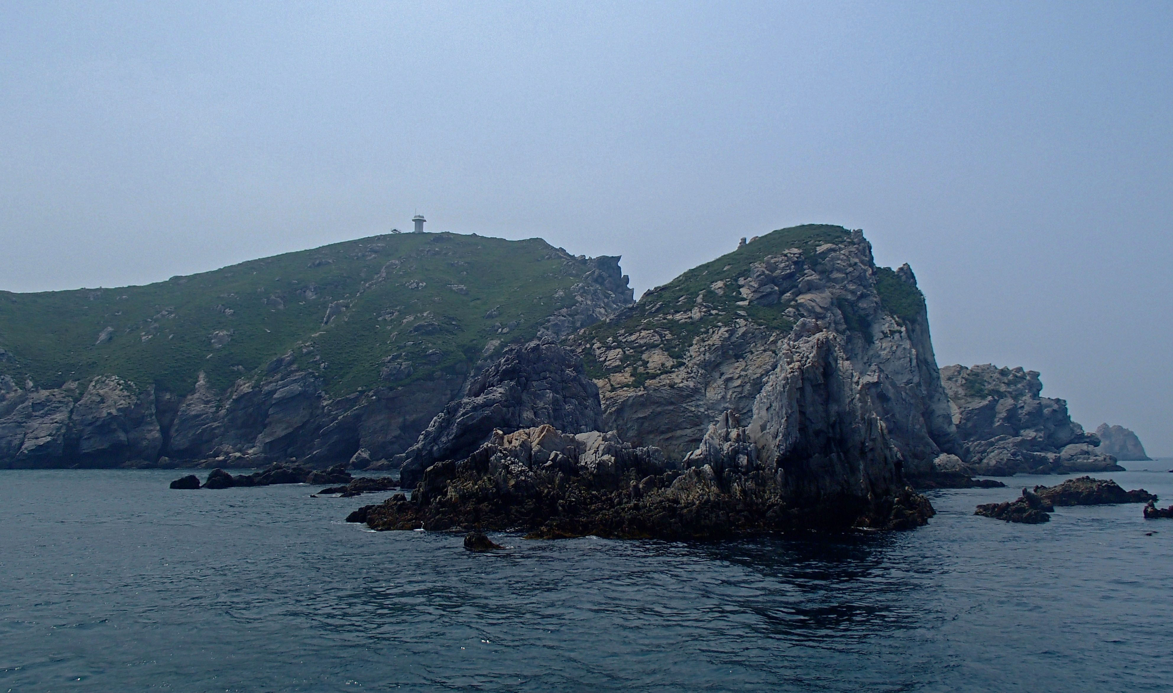 Rocky Korean island surrounded by the sea