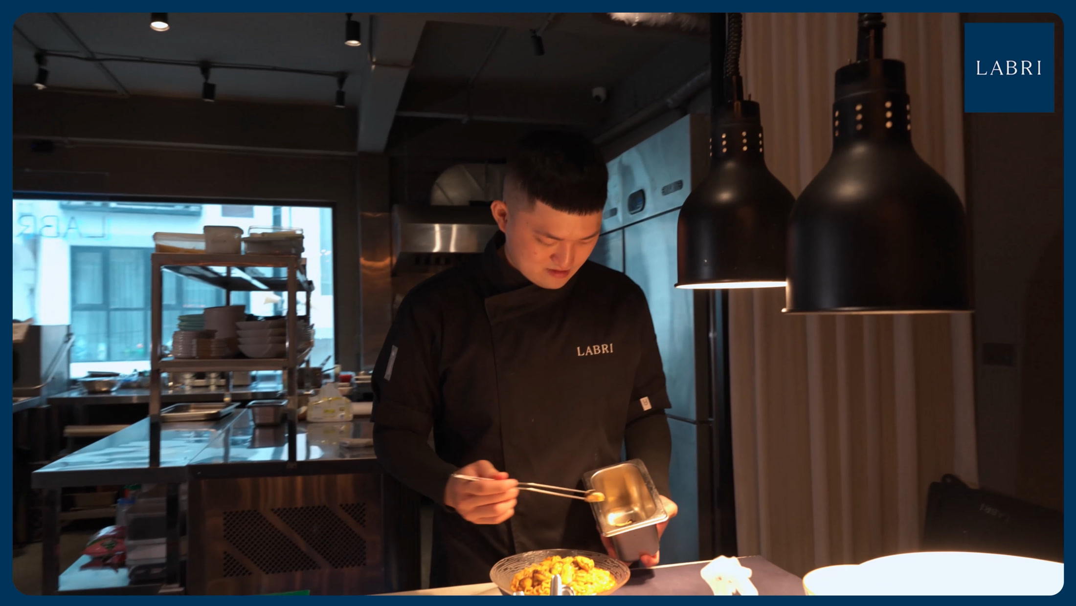 LABRI chef preparing a jointly developed seafood menu